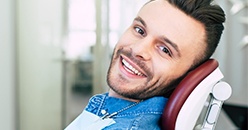 Man smiling in dental chair