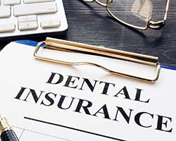 Dental insurance paperwork for the cost of dental emergencies in Enfield