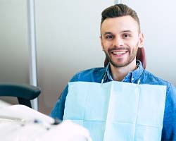 Happy patient at appointment for cleaning and checkup