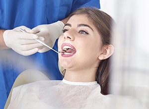 Woman in dental chair during exam
