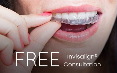 Patient inserting Invisalign tray