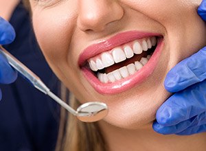 Closeup of smile during oral cancer screening