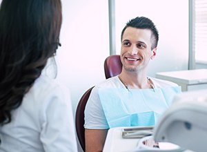 Man talking to dentist