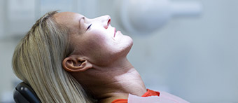 woman relaxed in exam chair