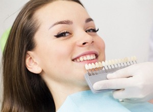 smiling dental patient with veneers