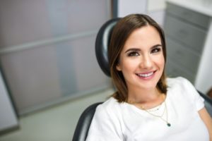 Patient smiling after visiting dentist for dental emergency in Enfield