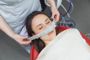 Patient relaxing while under the influence of nitrous oxide sedation