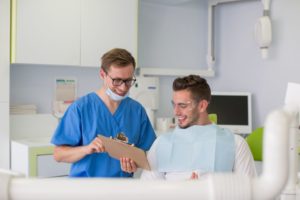 Patient and dentist having a friendly conversation