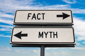 Fact and myth signs pointing in opposite directions 